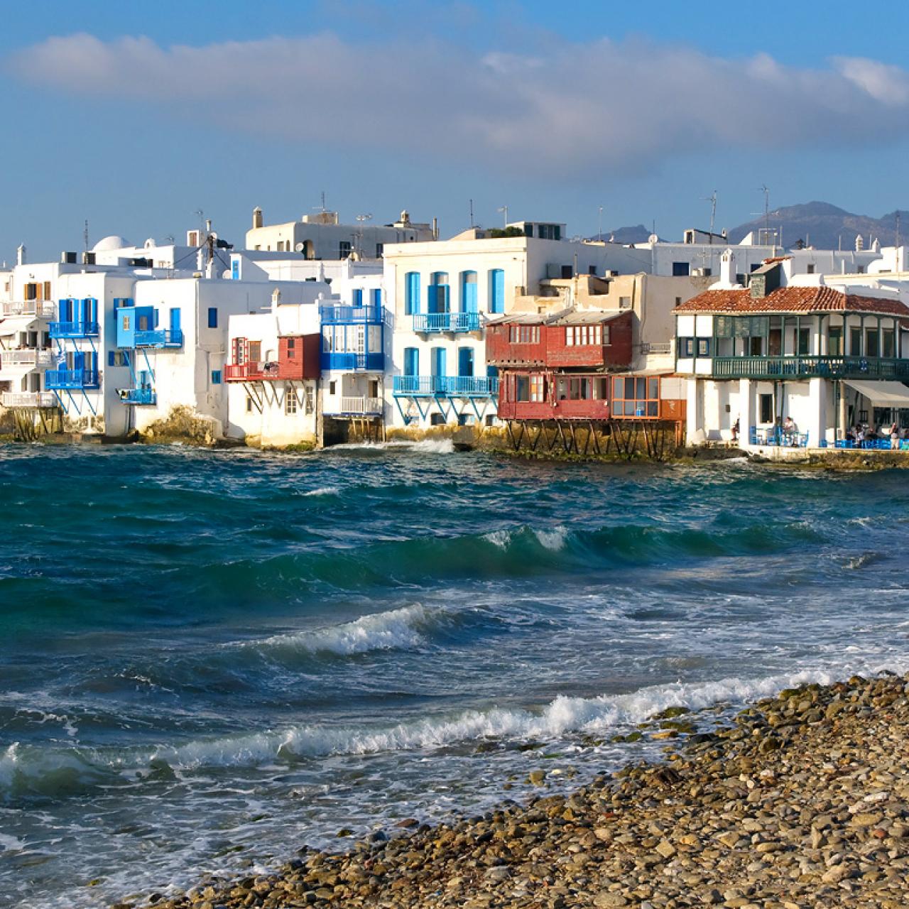 Beautiful sunny coast view to greek beach mediterranean blue sea