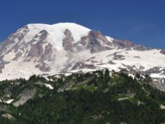 The landscape of Mt. Rainier National Park is punctuated by the enormity of the mountain itself -- a 14,000-foot-tall volcano looming over surrounding forests and meadows.