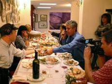Anthony Bourdain visits Sardinia, his wife's homeland, and enjoys a meal after a long day of shooting. 
