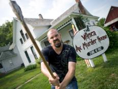 Aaron has an axe to grind outside the Villisca house.
