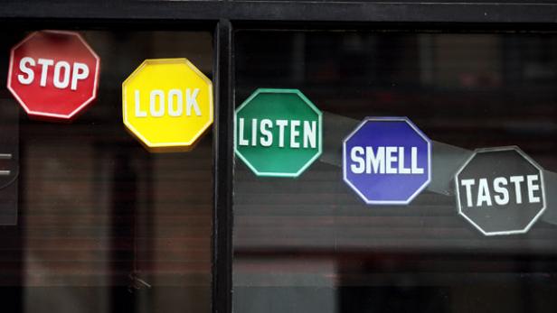 This sign in the window of a restaurant/nightclub in the Soho area of the City of Westminster encourages the public to indulge all their senses. Which isn't hard to do in Soho, London's gay and entertainment district. It has a high concentration of bars, cafés, nightclubs, restaurants and theaters, as well as adult shops and strip clubs. 