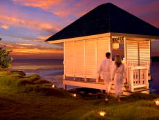 A couple retreats to the private gazebo at the Breezes Grand Resort & Spa in Negril, Jamaica. 