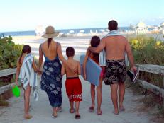  'Family walking to beach'