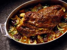 Watch Andrew Zimmern prepare braised rabbit in red wine with chimmichuri. Then prepare the dish in your own kitchen.