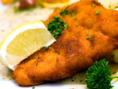  'Deep fried fresh Cod Fish with Potato and Sauce'