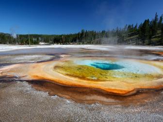<b>Yellowstone National Park</b><br>The spectacular sight of geysers spewing water and steam into the air only happens in a few places on Earth. The main stage for many is Yellowstone National Park -- it contains the world’s largest concentration of geysers.