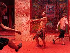 <b>La Tomatina</b> -- <br/>Revellers pelt each other during the world's biggest tomato fight at the Tomatina Festival on the last Wednesday in August, in Bunol, Spain.