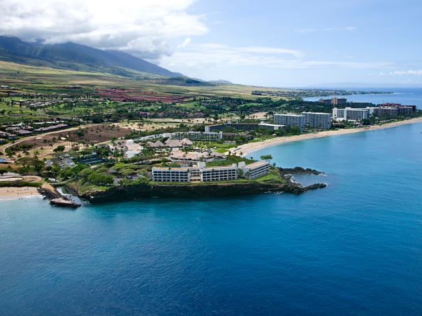  'Aerial view of buildings on coastline of Maui, Hawaii.'