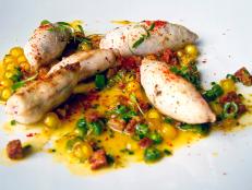 This is squid and prawn --a dish on the menu at Delaire Graff Estate’s Indochine Restaurant-- made with saffron tapioca pearls, chorizo, oven-dried peppers and fine beans.<br><br><strong>You May Also Like</strong><br><a href="http://www.ExpertVagabond.com">Matthew’s Expert Vagabond website</a><br><a href=" http://blog.travelchannel.com/the-traveling-type/2012/01/11/food-in-south-africa-springbok-or-bunny-chow/">Food in South Africa: Springbok or Bunny Chow?</a><br><a href="http://blog.travelchannel.com/the-traveling-type/2011/12/14/exploring-south-africas-wine-country/">South Africa’s Wine Country</a>