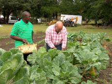 Andrew Zimmern with Melvin Green