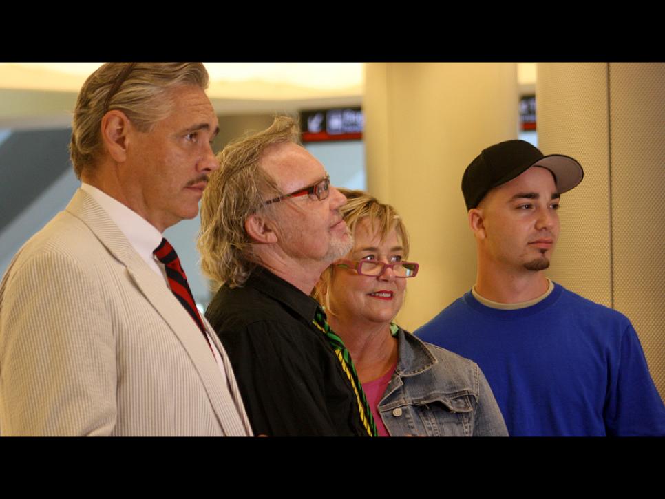 Laurence Martin, Sally Martin, Billy Leroy, Mark Meyer in an airport