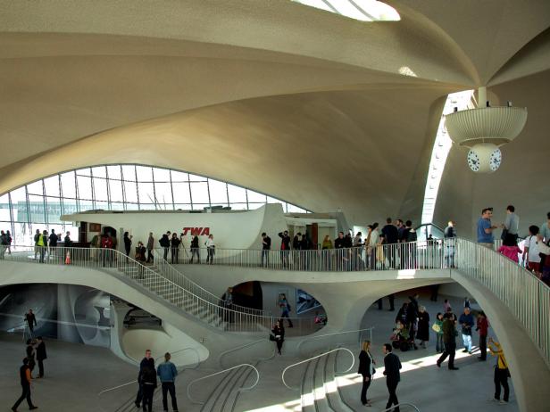 Designed by Eero Saarine, The TWA Flight Center or Trans World Flight Center, 1962 as a standalone terminal at NYC's JFK International Airport for Trans World Airlines. Today, after renovations, the old and new buildings comprise JetBlue Airways' Terminal 5.