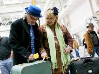 Laurence and Sally, inspecting suitcase they won during the Previews