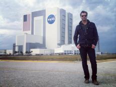 Don Wildman in front of the Kennedy Space Center
