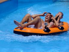 Aqualandia water park in Venice, Italy - Park Scenics- Joel & Axel laugh after splashdown on Scary Falls waterslide