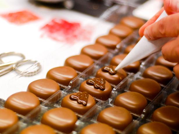 close up of chocolate being dressed