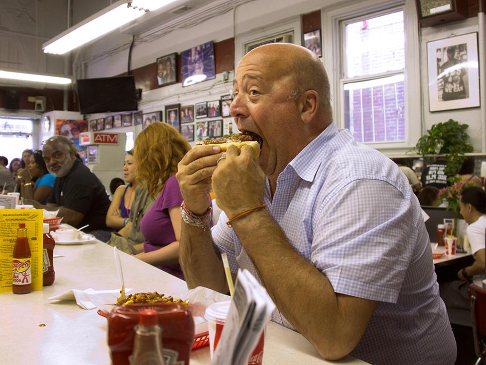 Andrew Zimmern eats a Ben's Chili Dog in Washington DC
