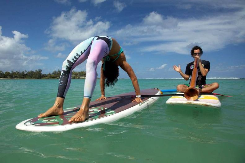 Welcome to <a href="http://www.travelchannel.com/interests/hot-topics/postcard-from/wanderlust-oahu">Wanderlust O'ahu</a>. Yogis take their practice to the crystal clear Hawaiian ocean for standup paddleboard yoga – the ultimate test of balance. Hawaii was the birthplace for <a href="http://www.travelchannel.com/interests/outdoors-and-adventure/photos/worlds-best-standup-paddleboarding">standup paddleboarding</a>, after all, so it's no surprise SUP yoga has taken off here,  too. 