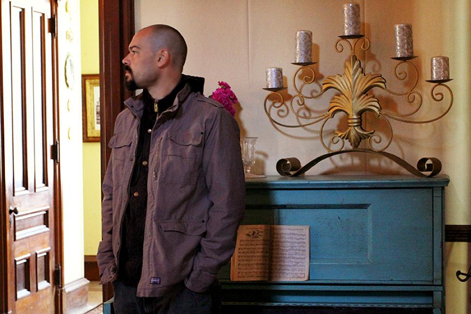 Aaron Goodwin in the Victorian mansion