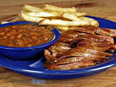 barbecue sausage, baked beans and french fries at Sonny's in Texas