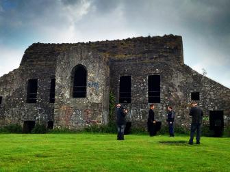  'The boys shooting in front of the Hellfire Club.'