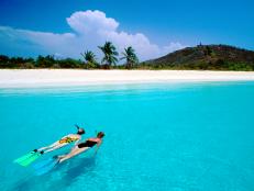 Snorkelling couple in the waters of Isla Culebrita in Puerto Rico