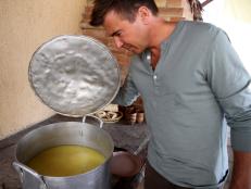 Jack checks out the khash as it stews in the pot while visitng Yous Sargsyan's guesthouse.