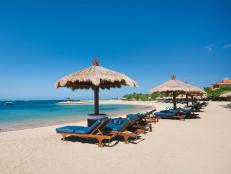 nusa beach, lounge chairs, umbrellas, bali, indonesia