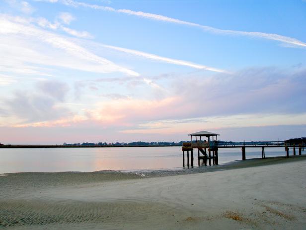 river bank, beach, dock, sunset, dusk, distant shore,