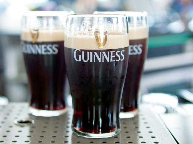 Guiness glasses on a bar