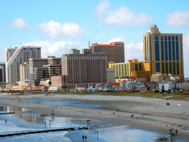 beach at atlantic city in new jersey at sunset with large casinos in background