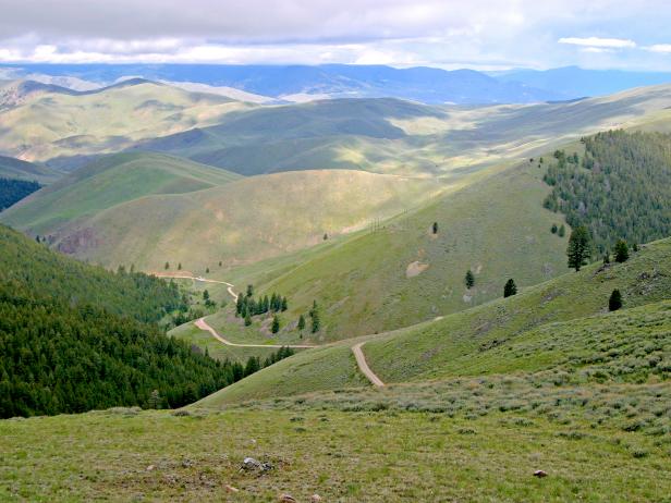 wide shot of the continental divide trail and mountains during the day