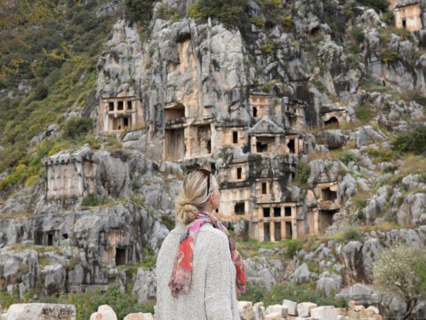 Woman explores site of ancient Greek ruin