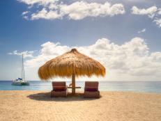Saint Lucia, Anse Chastanet beach, View of umbrella and sun loungers