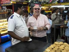 Andrew has a few laughs and Irani Chai tea with cab driver KK in Hyderabad.