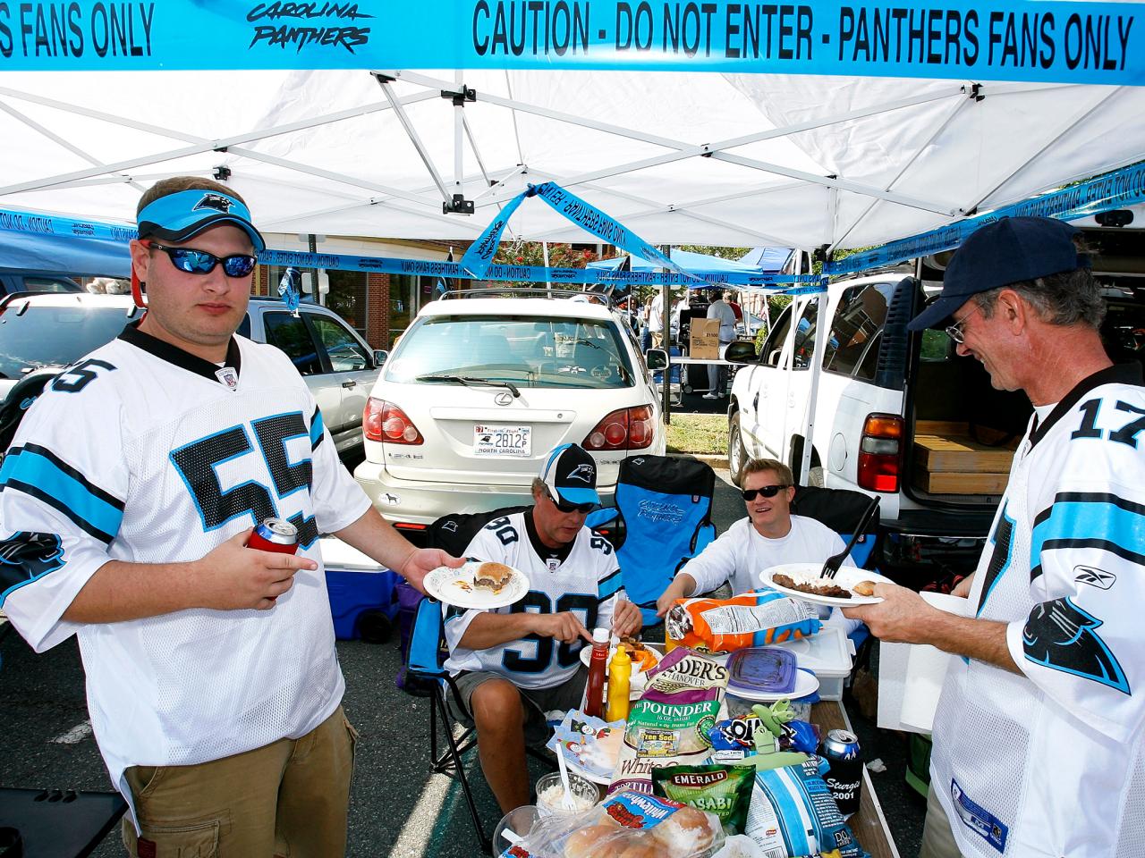 Fans tailgate prior to an NFL football game between the Houston