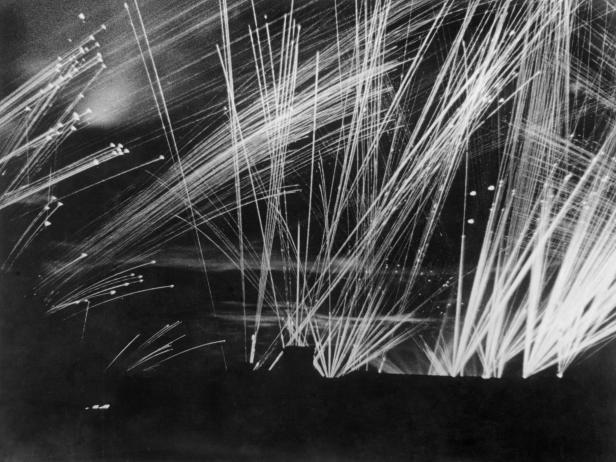 (GERMANY OUT) 2. World war, germany during... bomb attacks, air defence:anti aircraft searchlights and tracer ammunition during a night air raid on a german town.1943 (Photo by ullstein bild/ullstein bild via Getty Images)