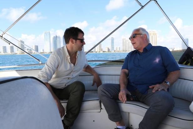 Host Christof Putzel with retired FBI Agent, Bob Wittman, on a boat in Miami, FL. As seen on Travel Channel s Mission Declassified.
