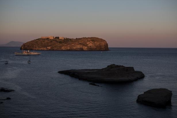 Santo Stefano Island with its bourbon prison and Cala Nave beach at Sunset, on July 14, 2020 in Ventotene, Italy. [Photo by Alessandra Benedetti - Corbis/Corbis via Getty Images]