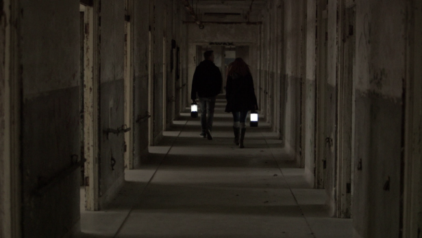 Amy Bruni and Adam Berry of Kindred Spirits investigate the 5th floor after the owner expressed concerns over a new entity. [screenshot via Discovery Inc.]