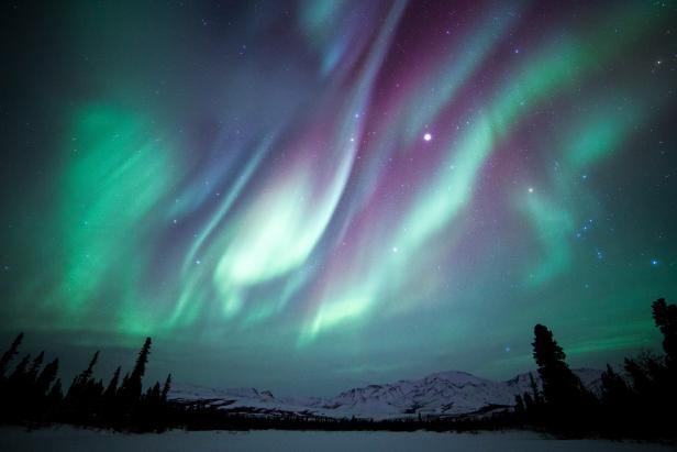 The Aurora Borealis, Orion and Jupiter over Denali National Park in Alaska.