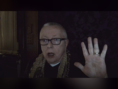 Psychic medium Chip Coffey reacts during a remote viewing session of the USS Salem