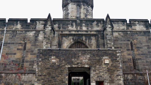 A photo of Eastern State Penitentiary in Philadelphia, PA. A gothic style building.