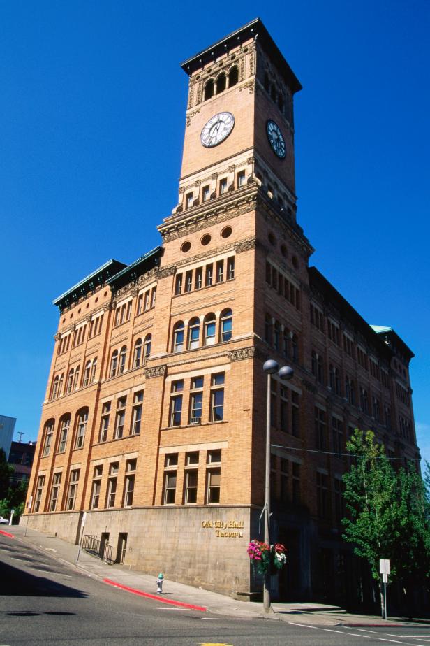 street view of Old Tacoma City Hall in Tacoma, Washington during the afternoon surrounded by clear blue skies