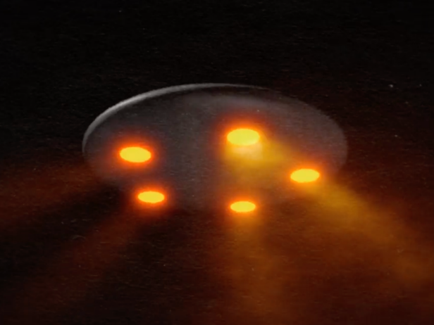 Photo of a UFO with five light beams. 