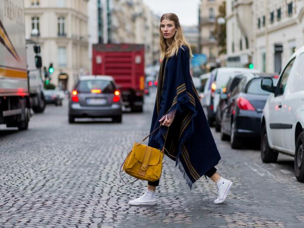 PARIS, FRANCE - SEPTEMBER 29: Veronika Heilbrunner wearing a Chloe poncho, Chloe Lexa bag and Converse sneaker outside Chloe on September 29, 2016 in Paris, France. (Photo by Christian Vierig/Getty Images)