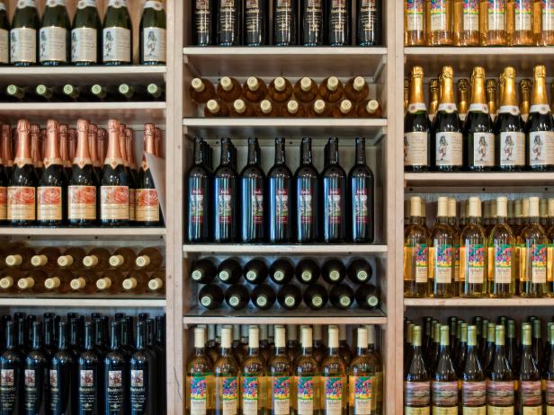 Kula, Hawaii, USA - February, 3rd 2010: Bottles of Wine neatly displayed at the wine tasting room at Tedeschi Vineyards in Up Country on Maui. The vineyard is located on the Ulupalakua Ranch and is open to the public for wine tasting and purchases.