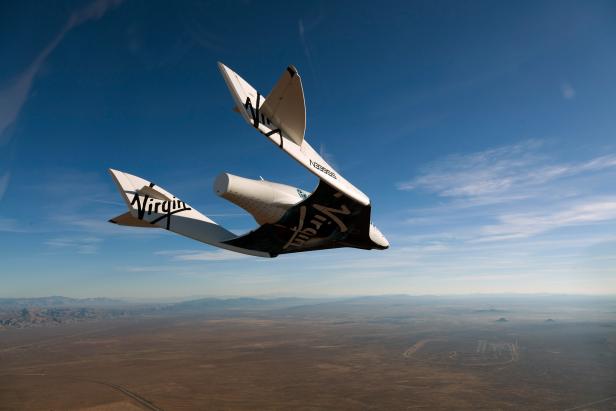 MOJAVE, UNITED STATES - OCTOBER 10:  (EDITORIAL USE ONLY, NO SUBJECT SPECIFIC TV BROADCAST DOCUMENTARIES OR BOOK USE)  Virgin Galactic vehicle SpaceShipTwo completes it's successful first glide flight at Mojave on October 10, 2010 over Mojave in California. (Photo by Mark Greenberg/Virgin Galactic/Getty Images)