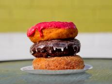 PORTLAND, ME - SEPTEMBER 25: A stack of donuts, from top include a raspberry glazed, dark chocolate sea salt, and vegan cinnamon sugar, at The Holy Donut on Park Avenue in Portland Thursday, September 25, 2014. Leigh Kellis, owner of the business, is constantly trying to determine how many donuts to make for the day so as not to run out, but also not to make too many. (Photo by Gabe Souza/Portland Press Herald via Getty Images)