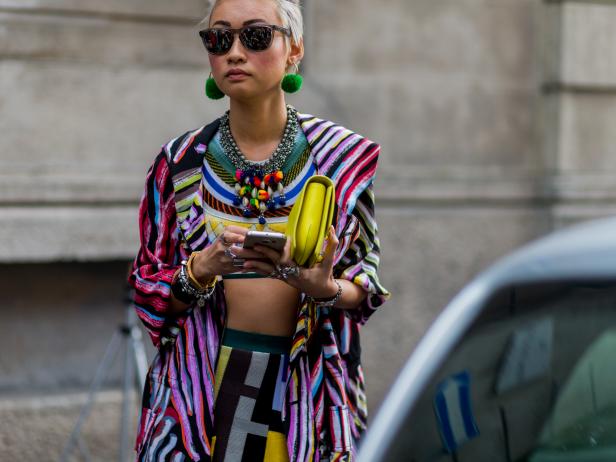 MILAN, ITALY - JUNE 19: Esther Quek outside Prada during the Milan Men's Fashion Week Spring/Summer 2017 on June 19, 2016 in Milan, Italy. (Photo by Christian Vierig/Getty Images)